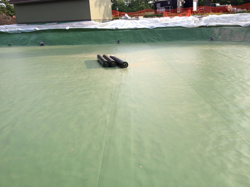 green swimming pool liner