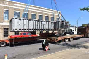 The Commonwealth penthouse pool being lifted from the truck